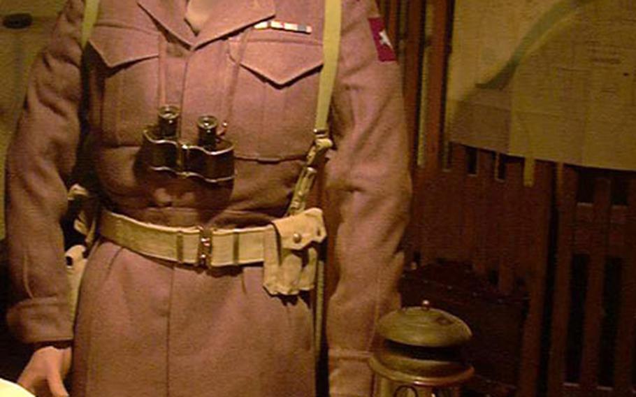 A figure representing British Maj. Gen. R.E. Urguhart wears the binoculars and beret the general wore in 1944 when he commanded troops from the hotel where the Airborne Museum is now housed in Osterbeek, Netherlands. Sean Connery portrayed the general in the movie "A Bridge Too Far."