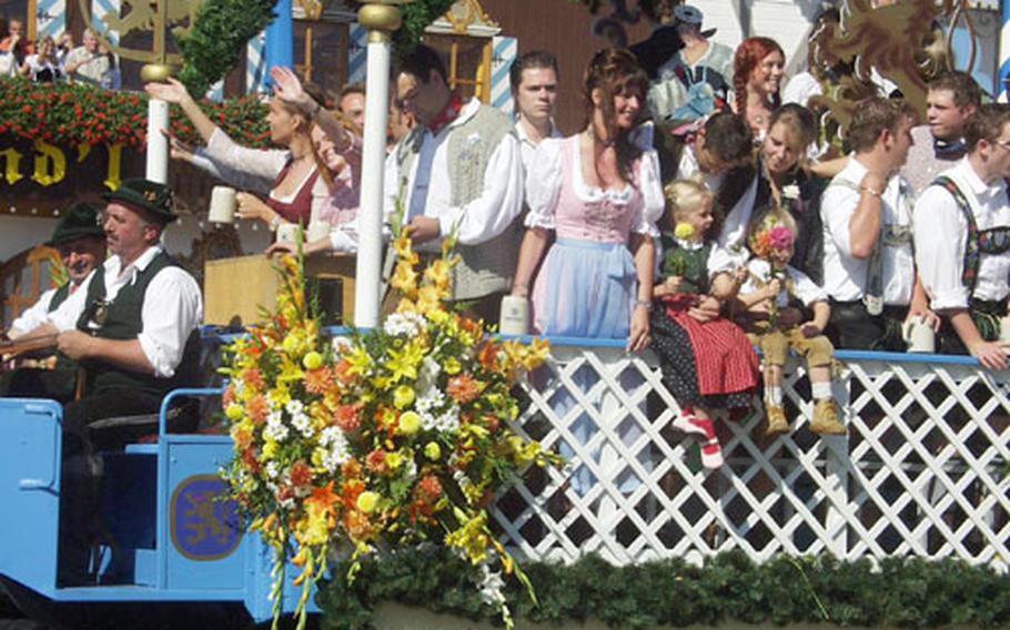 The Lowenbrau float rolls by during Saturday&#39;s parade to open the 2004 Oktoberfest in Munich, Germany.