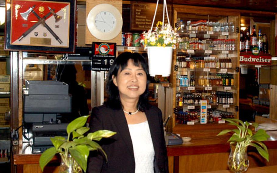 South Korean Tae Myong Hui, who has managed the Fiddlers Green restaurant and bar at Camp Stanton, South Korea, for the past four years, said she will miss working at the small installation.