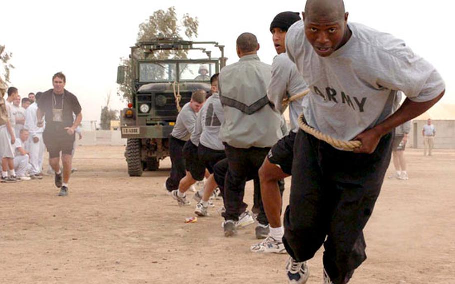 Soldiers at FOB Speicher, Iraq, compete in the five-ton truck pull on Friday as they try to win the Veterans Day Commander&#39;s Cup.