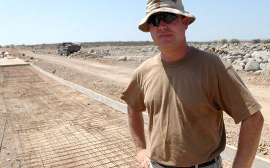 Tech. Sgt. Marshall Brown of the 823 Red Horse Air Force Combat Civil Engineer Squadron helped build this ford across a dry river bed just south of Djibouti City. The ford will enable the road to hold up after floodwaters subside.