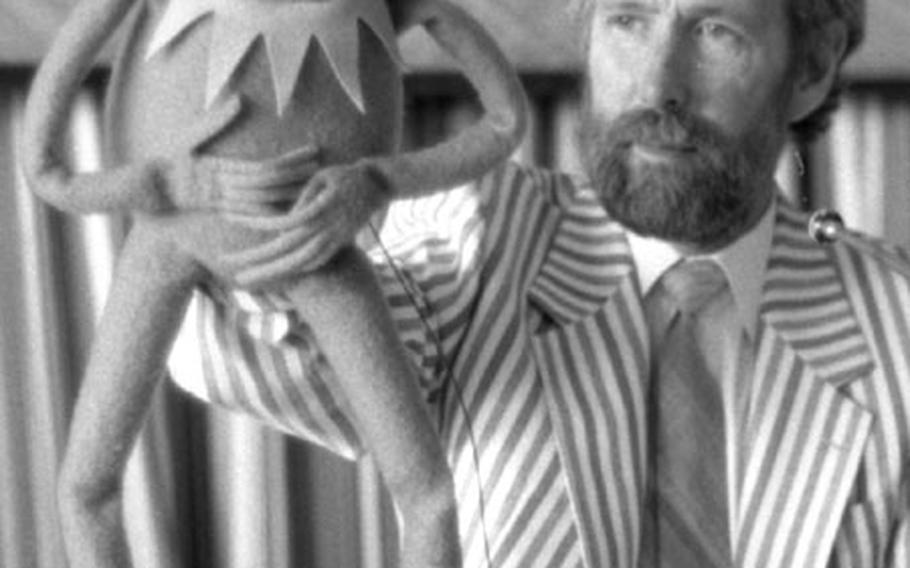 Jim Henson, creator of the Muppets, speaks (with an assist from Kermit the Frog) to the Foreign Correspondents Club of Japan.