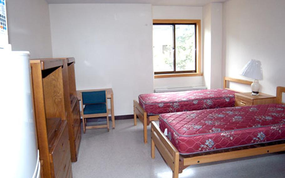 A room awaits occupancy by two junior enlisted soldiers in the newly-built four-story barracks at Army&#39;s Camp Henry in Taegu, South Korea.