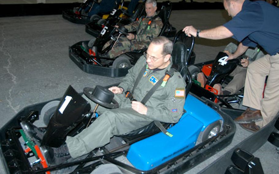 Brig. Gen. Mark Anderson, lead evaluator for the Commander In Chief’s Installation Excellence Award team, takes a spin in a go-cart Tuesday morning at the Weasel’s Den, Misawa Air Base, Japan. Misawa is one of three finalists for the Defense Department award that recognizes bases for maximizing resources to improve mission and quality of life.