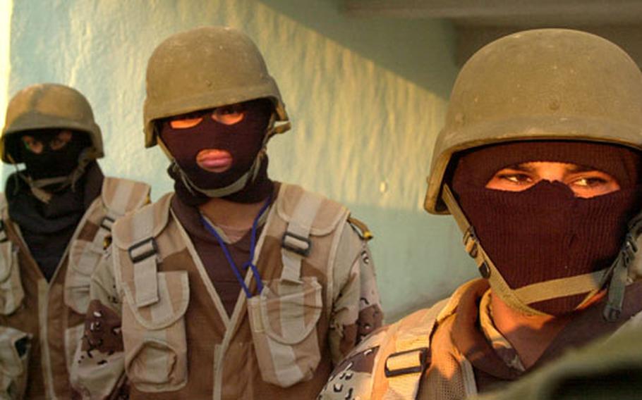 Iraqi Army soldiers take a substantial risk joining up, including bombings at recruitment stations. Most soldiers wear masks when on missions to keep their identities hidden.