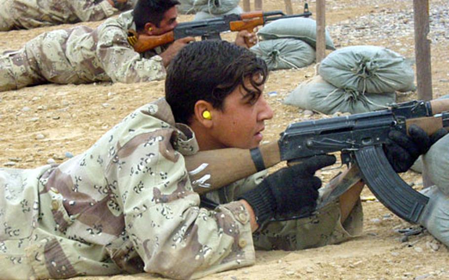 Walid, a recruit from the 203rd Iraqi National Guard Battalion, practices his marksmanship drills at a base near Ad Duluiyah, Iraq, under the guidance of instructors from the 1st Infantry Division&#39;s 1st Squadron, 4th Cavalry Regiment.