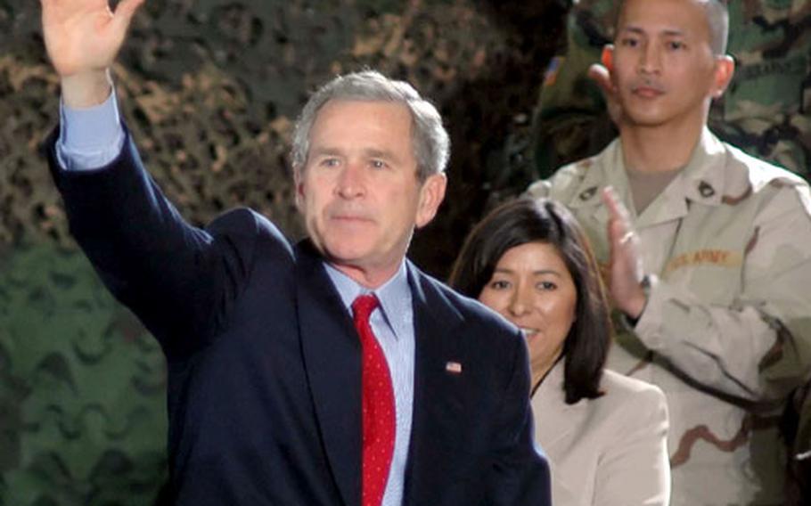 President Bush waves to the crowd after his speech Wednesday at Wiesbaden Army Airfield, Germany.