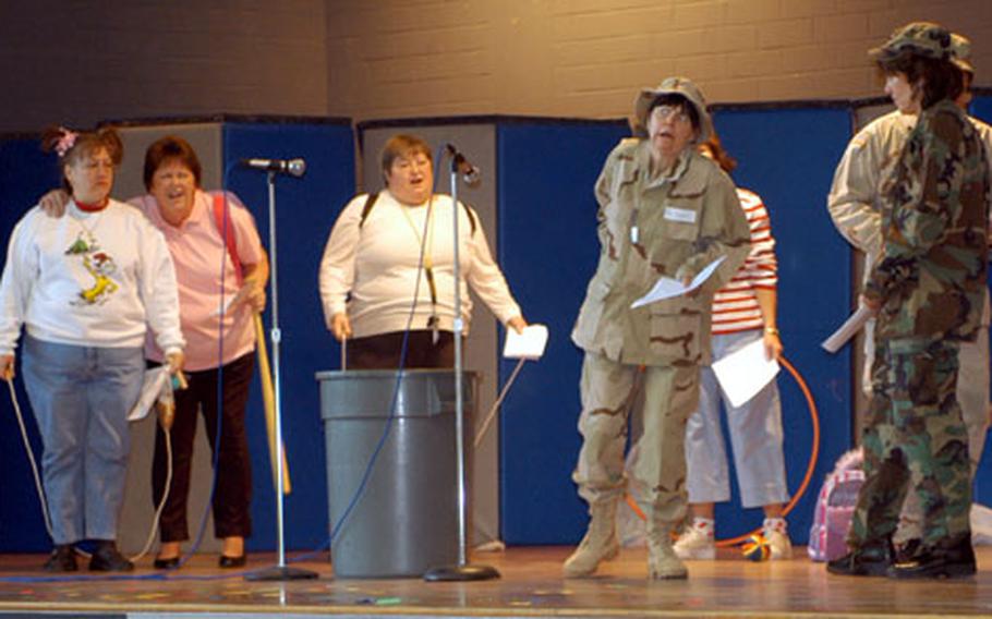 Bamberg Elementary School teachers pretend to be pupils and soldiers in a skit based on the story of "Stone Soup" Wednesday for Read Across America. The "soldiers" were hungry after returning from Iraq and decided to make soup in a new version of the old tale.