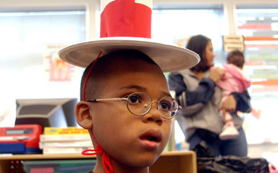 Jaeshaan Thomas, a second-grader at Sollars Elementary School, Misawa Air Base, Japan, wears a "Cat in the Hat" hat on Wednesday.