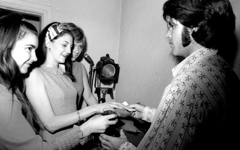 Rick Nelson meets his fans during his tour of Germany in March, 1970.