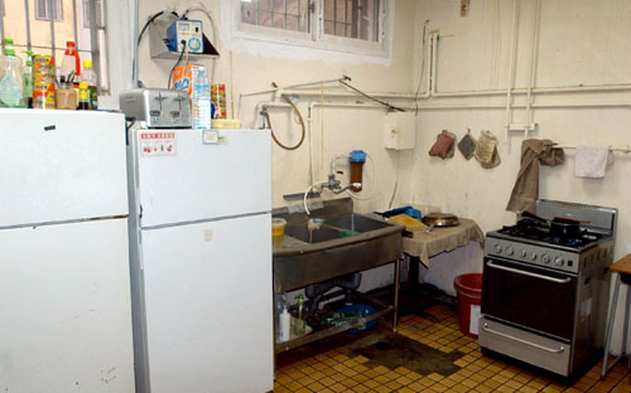 The U.S. prisoners share a kitchen where they prepare their own meals from ingredients supplied by U.S. Forces Korea under the Status of Forces Agreement.