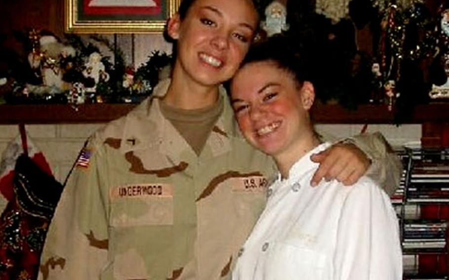 Pfc. Kara Underwood gives her sister Kate a hug. Kate, who promised to keep her big sister supplied in toiletries and goodies while in Iraq, went a step further and created a program in her hometown of Birdsboro, Pa., that raises money and ships donated items to her sister’s fellow troops in Mosul.