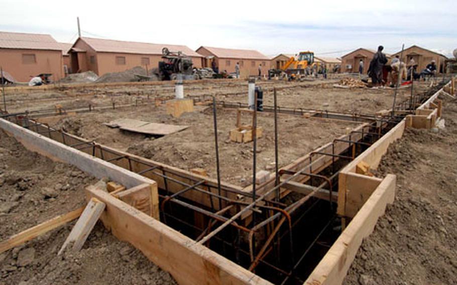 The foundations are set for the first brick-and-mortar barracks building on Bagram Air Base to replace the B-huts now being used.