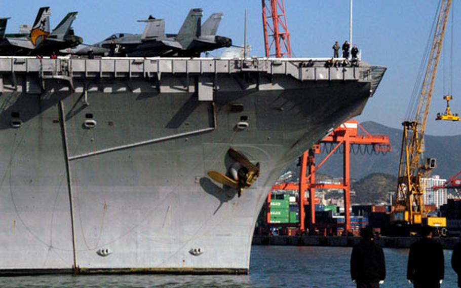 The USS Kitty Hawk pulls into Busan port in 2005. According to media reports, South Korea this week refused to allow a Japanese warship to dock at its port in Busan in advance of a four-country naval exercise.