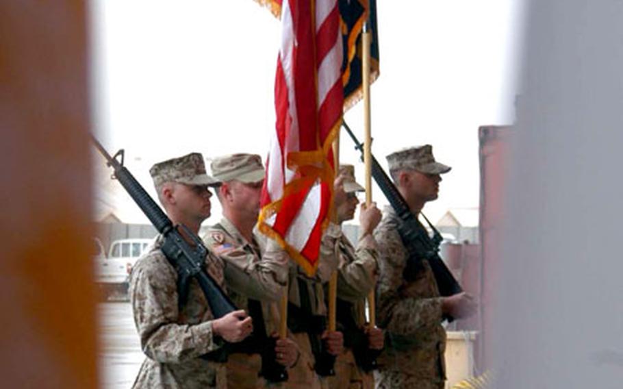 The Combined/Joint Task Force-76 color guard are shown during the transfer of authority ceremony at Bagram Air Base, Afghanistan.