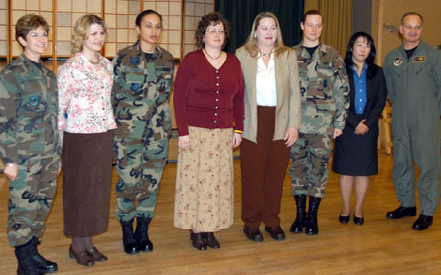Winners of the Women Change Misawa Recognition Award are flanked by Maj. Gen. Barbara C. Brannon, the Air Force&#39;s top-ranking nurse, and Col. Don Weckhorst, vice commander of 35th Fighter Wing. The awardees, recognized at a Women&#39;s History Month luncheon at Misawa Air Base, Japan, Wednesday, are, from left, Sharon Stone, Maj. Samia Ocha, Rochelle Phelps, Lisa Wangelin, Staff Sgt. Gloria Banks and Kyoko Hasegawa.