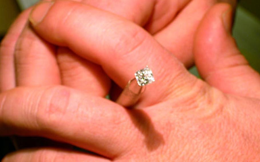 A close up view of the 1.5-carat diamond that came with John Ridley&#39;s $9,800 martini. Ridley sold the diamond and donated the proceeds to the Walter Reed Society.