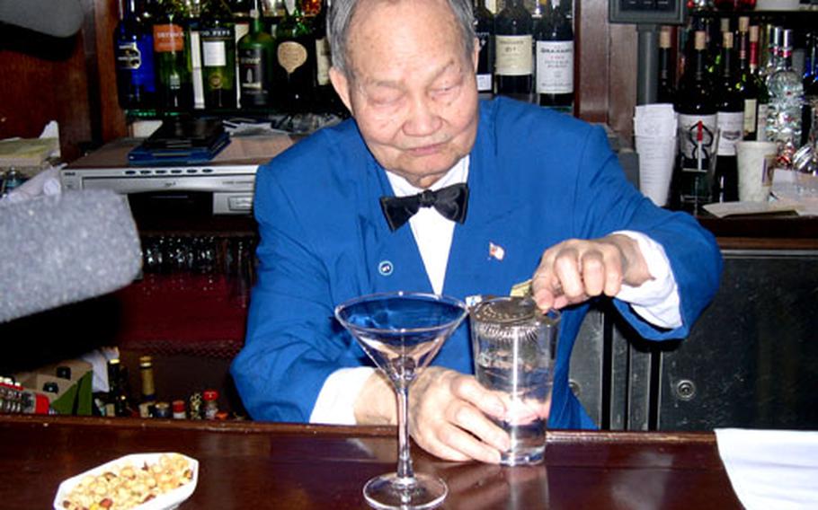Hoy Wong, a bartender at the Algonquin Hotel for 26 years, served John Ridley his $9,800 martini but nearly threw out the diamond in the drink when clearing the bar.