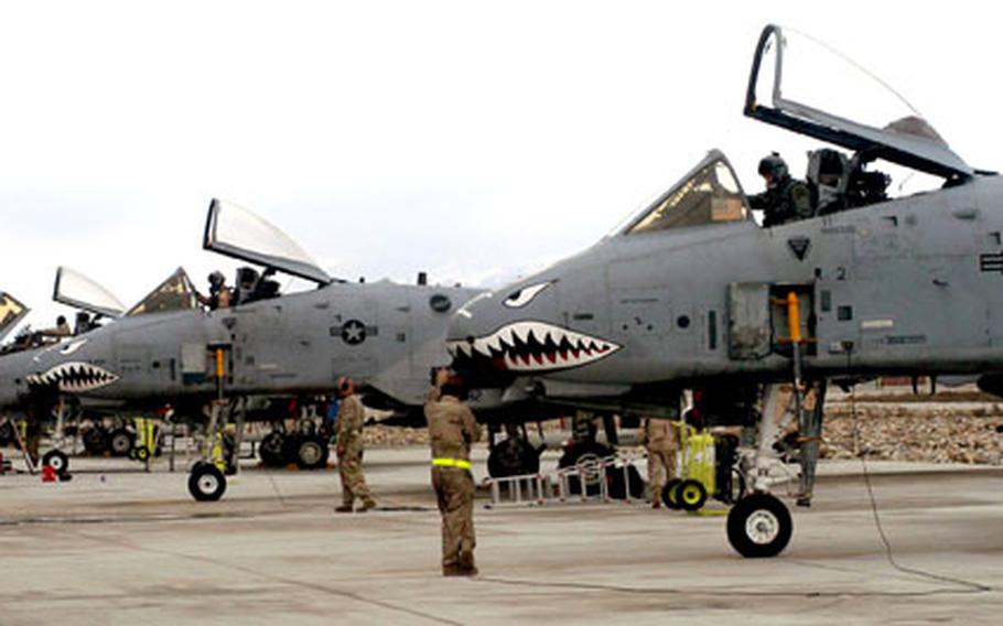 A-10 "Warthog" pilots and ground crews at Bagram Air Base prepare for another sortie over Afghanistan.