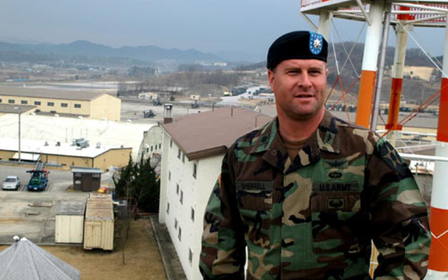 1st Battalion, 2nd Aviation Regiment commander Lt. Col. Chandler Sherrell looks over his unit’s new home — Camp Eagle, near Wonju, South Korea. The unit moved after Camp Page was closed down.