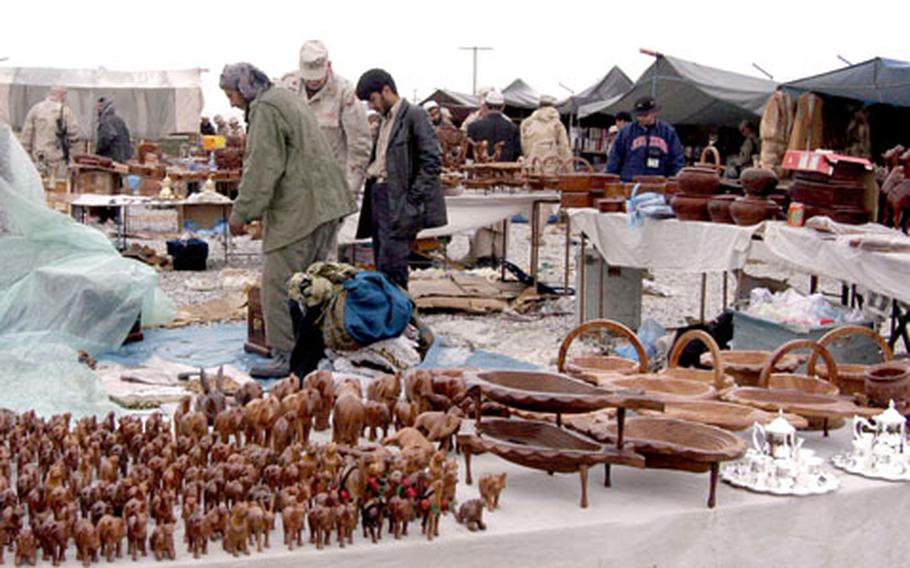 The weekly Friday bazaar at Bagram Air Base, like this one on March 18, has been closed for three weeks after rocket attacks on the Afghanistan base sparked security concerns.