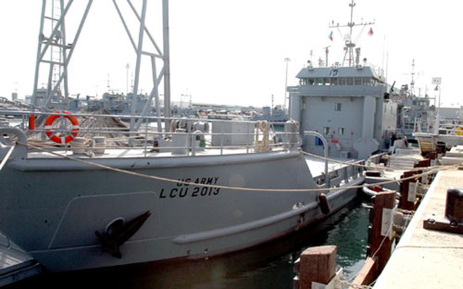 The U.S. Army landing craft utility Churbusco sits pier side Thursday at Kuwait Naval Base, Kuwait.