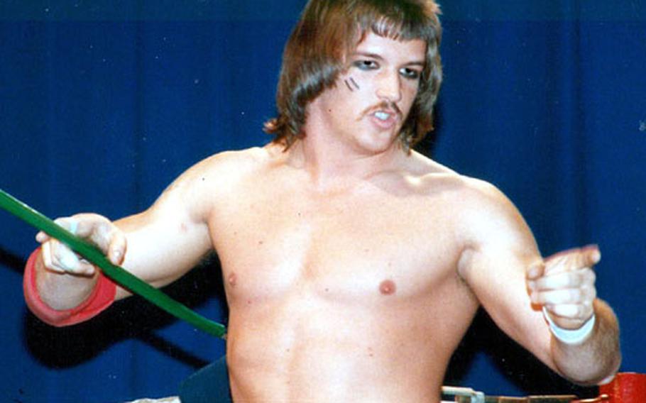 Senior Chief Petty Officer Glen Holbrook, as a wrestler in his younger days in Georgia before joining the Navy.