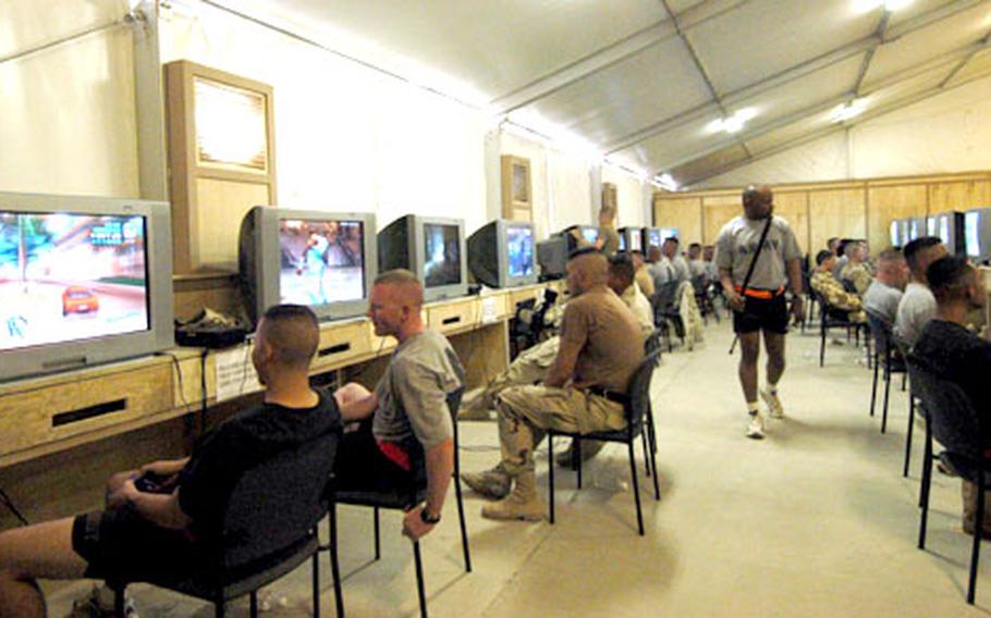 The video game room at the Kandahar Airfield, Afghanistan, MWR center is popular with the troops.