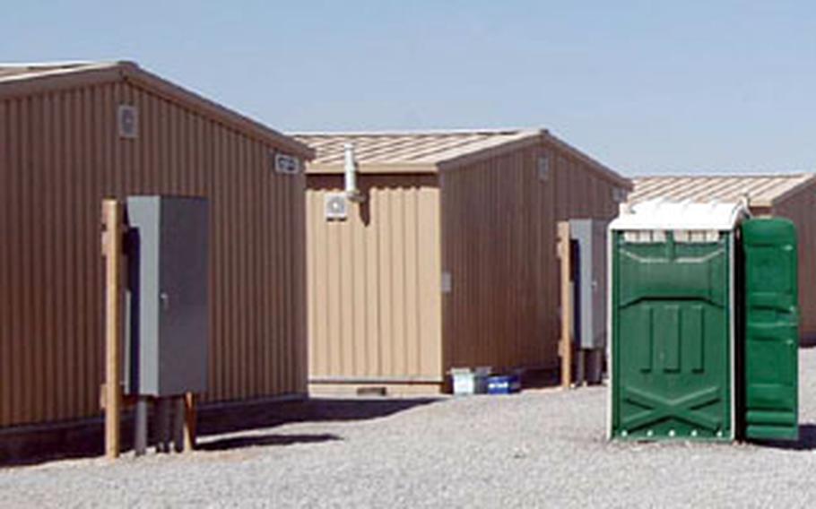 The new modular housing at Kandahar airfield, Afghanistan, features seven rooms that house two to four people per room. The portable toilets soon will disappear, as the housing will have indoor plumbing in the near future.