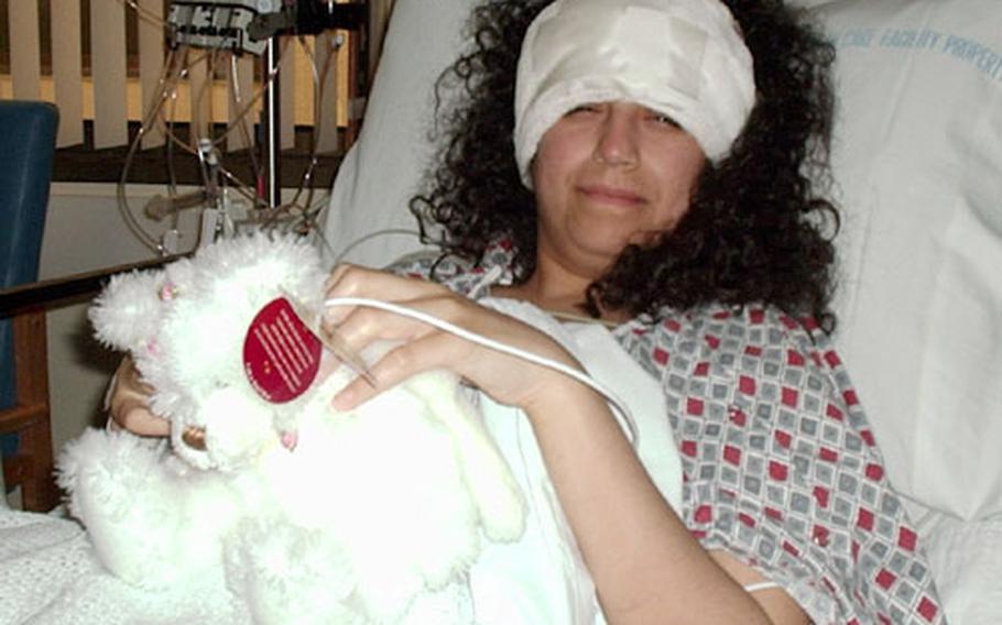 Senior Airman Abigail Foster, two days after undergoing surgery in April 2004.