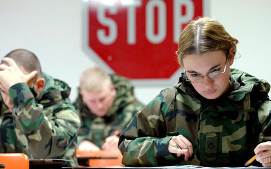Pfc. Tasha Craft takes the test for a U.S. Army Europe driver’s license in Darmstadt, Germany, last week.
