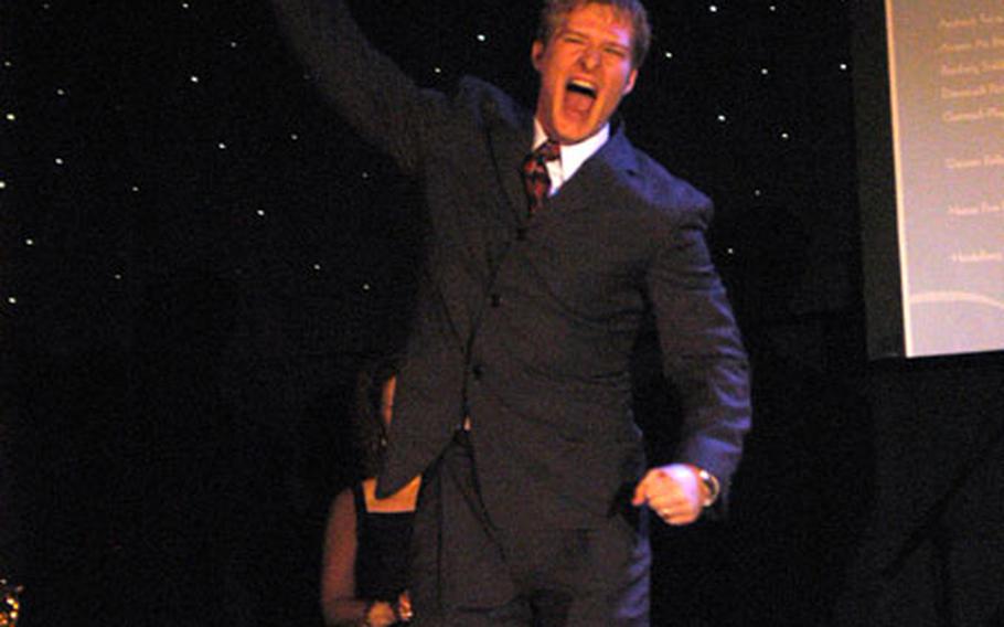 Chris Spears celebrates winning a Topper for best actor in a musical for his performance in Kaiserslautern&#39;s "Godspell."