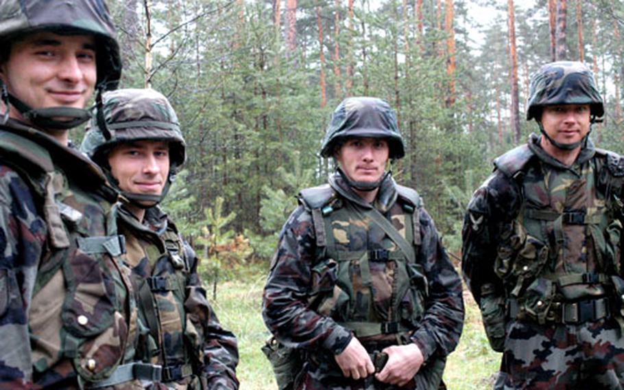Slovenian army corporals, from left, Damjan Benkovic, Danilo Ganc, Jakec Zbontar Skraba and Bostjan Pirman, are the first soldiers from Slovenia to go through the Army’s primary leadership development course at the Grafenwöhr, Germany, noncommissioned officer academy.