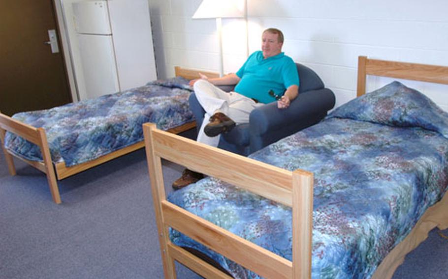 Bill Salter, director of Marine Corps Air Station Iwakuni&#39;s Bachelor Housing Division, in one of the renovated barracks buildings.