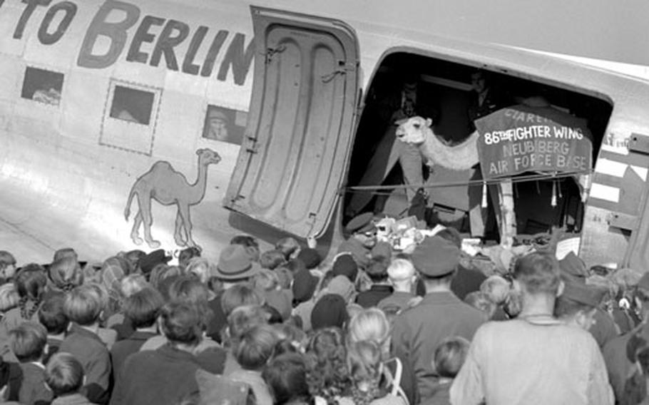 The ''Camel Caravan'' stops at Wiesbaden, Germany, on its way to Berlin in October, 1948.