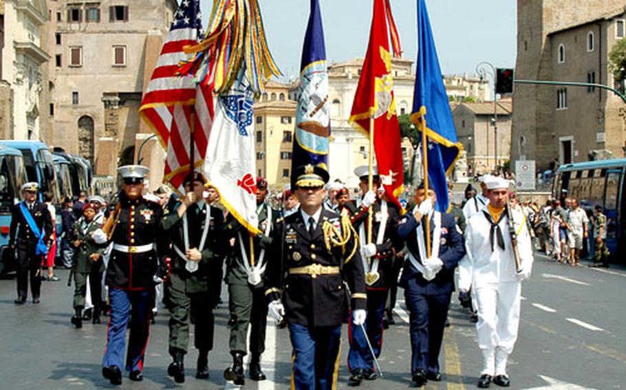 About 50 U.S. military members march through the cobblestone streets of Rome on Thursday during the country’s Republic Day. Col. Elliot Rosner leads the group past the Italian Tomb of the Unknown Soldier.