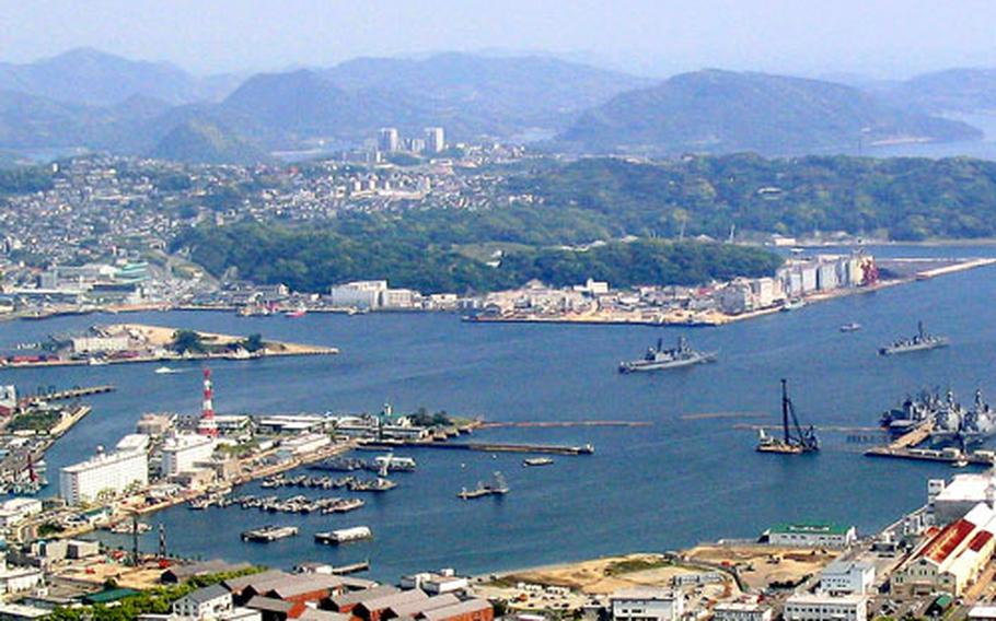 A view of Sasebo Naval Base’s Juliet Basin from the top of Mount Yumihari shows the body of water lined by base facilities.