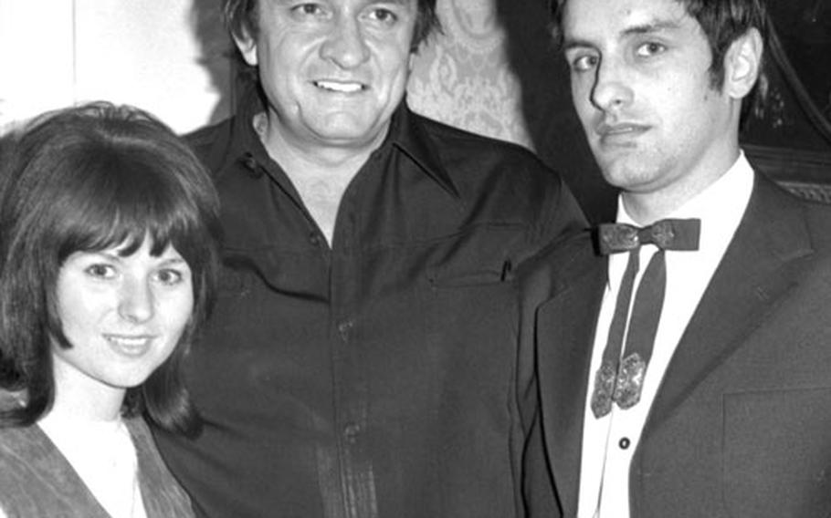 Heidi and Edgar Schuchardt with Johnny Cash, whose music they said was a factor in their decision to defect from East Germany.