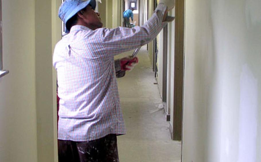 A new paint job is just part of the major repair work under way at the Camp Henry project site. As part of the same project, two barracks at Camp Carroll in Waegwan are getting a similar overhaul.