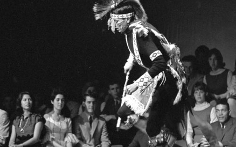 Bill Pensoneau of Ponca City, Oklahoma, performs a Ponca Indian dance.