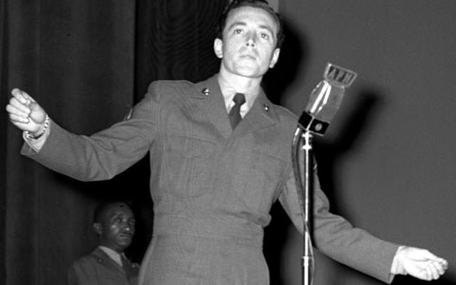 Vic Damone performs at the American Theater in Nurnberg, Germany, in December, 1951.