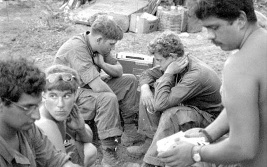 Soldiers from the 11th Cavalry Regiment take a rest in Cambodia in May, 1970.