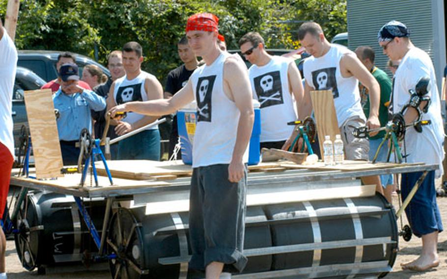 The Aircraft Intermediate Maintenance Department (500 division) team’s “The Rum Runner” won most innovative boat for its use of bicycle pedals and other parts — but the metal-laden vessel sank Thursday.