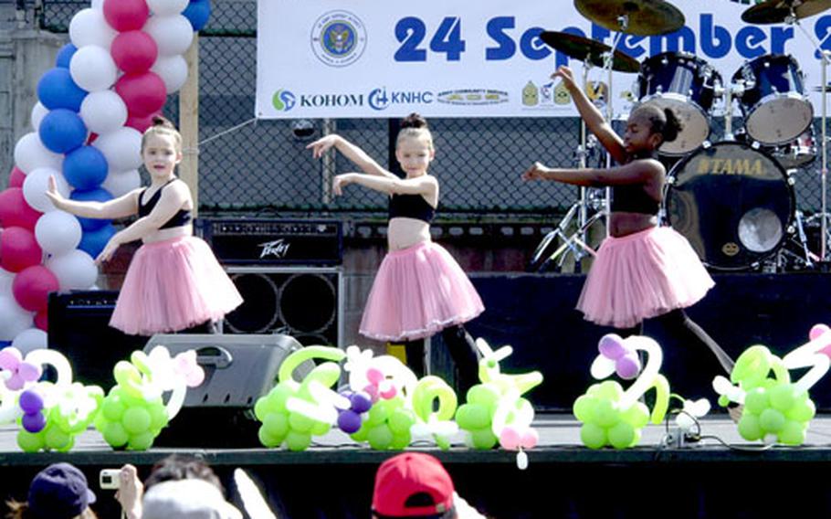 Base youths give a dance performance during the Hannam Village Community Festival on Saturday. The festival honored Korean history and traditions.