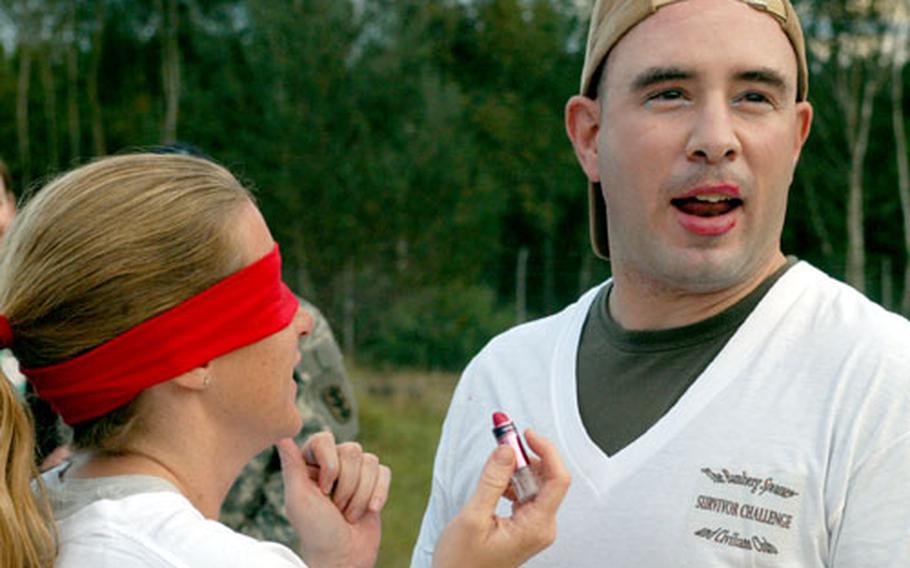 Maj. David Knellinger shows off the blind makeup job done by Heather Stoner.