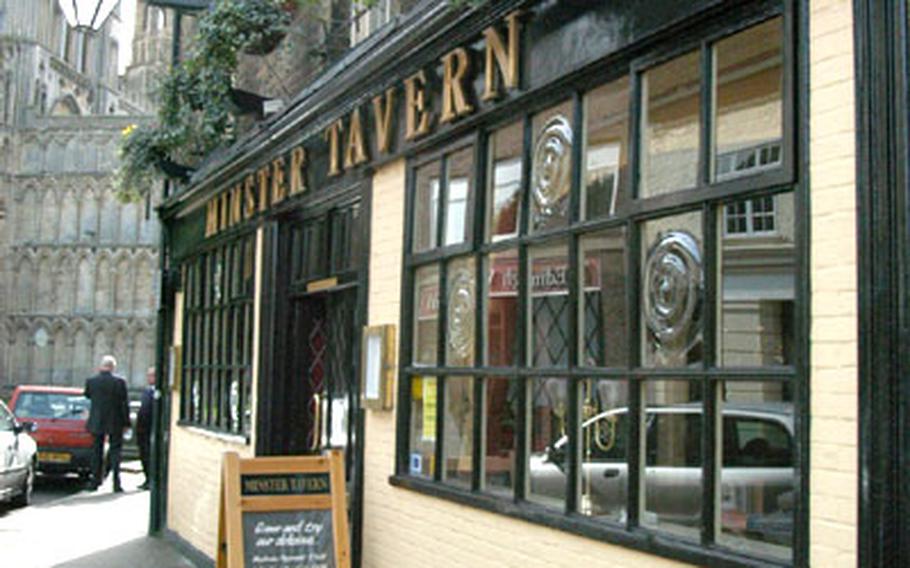The Minster Tavern in Ely, just a stone&#39;s throw from the stately Ely Cathedral (in background).