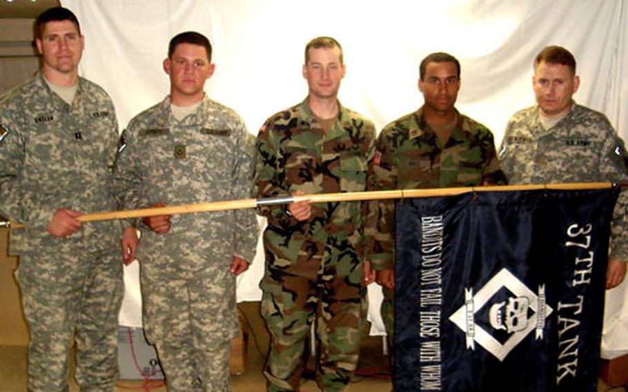 From left, Capt. Daniel Enslen, Pfc. Andrew Lovato, Spc. Christopher Cafaro, Staff Sgt. Melvin Baez and Maj. Matthew Van Wagenen were among the soldiers from the 1st Battalion, 37th Armor Regiment who helped two German employees escape a fire.