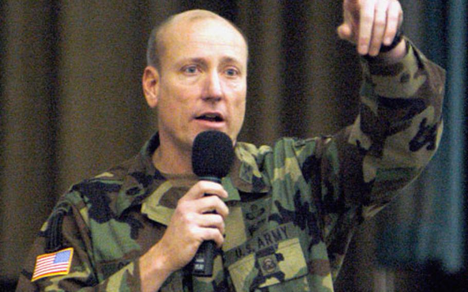 Lt. Col. Mark Gorton, commander of V Corps&#39; Special Troop Battalion, addresses soldiers and family members Wednesday night.