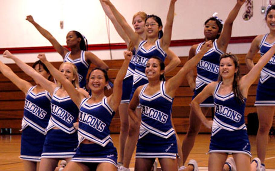 The Seoul American High School Falcons, from Yongsan Garrison, South Korea, finish a routine.