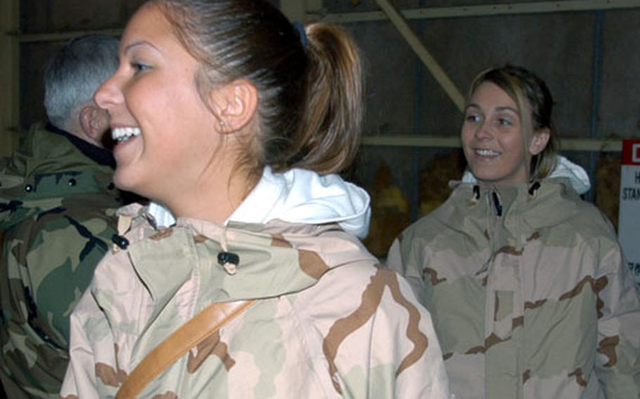 Airman 1st Class Malory Sellers was all smiles after stepping off a plane Monday night.